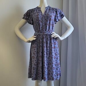 Blue dress with red floral bunches